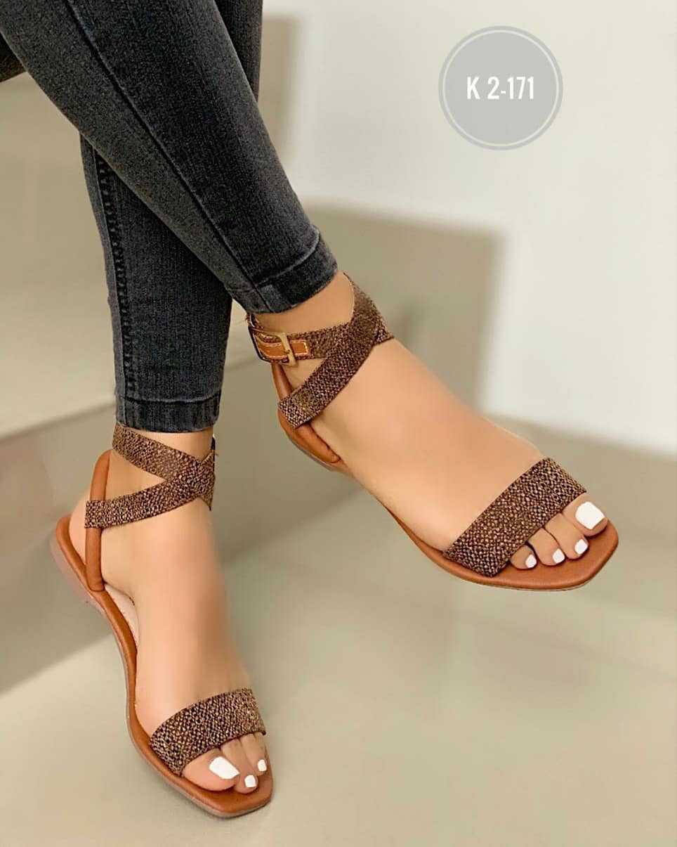 Women's flat casual sandals with a buckle strap